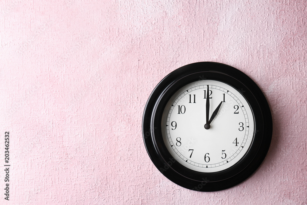 Poster Big black clock on color background. Time change concept