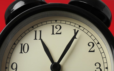 Alarm clock, closeup. Time change concept