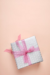 Elegant gift box for Mother's Day on color background, top view