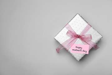Elegant gift box for Mother's Day on light background, top view