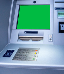 New modern ATM bank teller automatic bank machine with contactless sign next to the keyboard keypad stainless-steel buttons and green chroma key display screen monitor