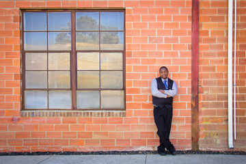 African American young male dressed up cool pose