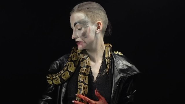 Woman in image with pythons