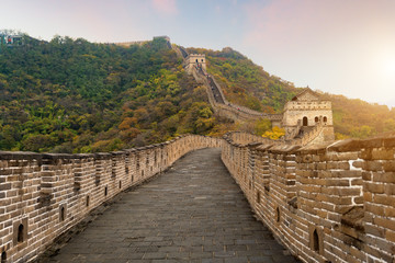 China The great wall distant view compressed towers and wall segments autumn season in mountains near Beijing ancient chinese fortification military landmark in Beijing, China.