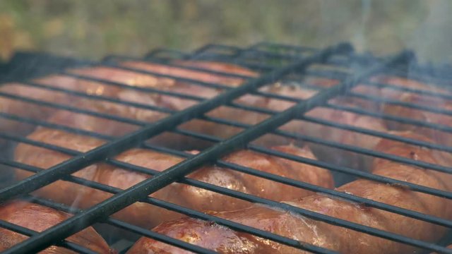 Grilled sausages on bbq. Variety Original Nuremberg Rostbratwurst . Pork ground meat, dill, nutmeg, garlic, cardamom, marjoram in the natural gut. There are also other types: rostbratwurst, currywurst