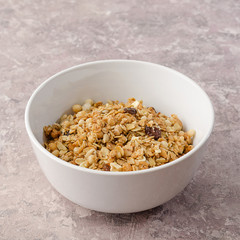 Granola in a white bowl