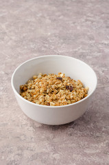 Granola in a white bowl
