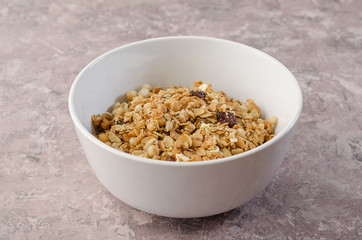 Granola in a white bowl