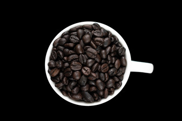 Roasted coffee beans in a white glass