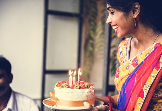 Indian Family Celebrating A Birthday Party