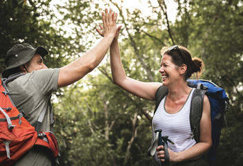 Naklejka premium Couple giving a high five