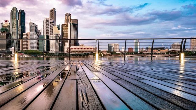 Early Morning Timelapse of Singapore City, with beautiful Sunrise Colors - pan