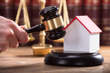 Judge's Hand Striking Gavel