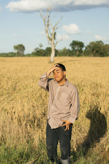 Brown Skin Farmer And His Rice Field