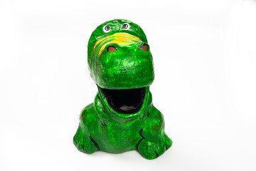 colorful dinosour made from recycle paper called paper mache to save environment
