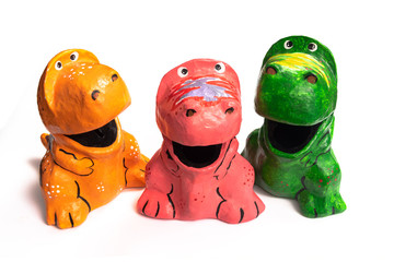 colorful dinosour made from recycle paper called paper mache to save environment