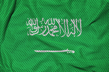 Saudi Arabia flag printed on a polyester nylon sportswear mesh fabric with some folds