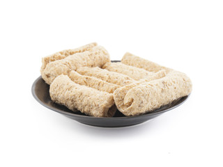 Indian Sweet Gajak Food Also Know As Dry Fruit Roll Isolated on White Background