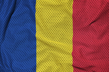 Romania flag printed on a polyester nylon sportswear mesh fabric with some folds