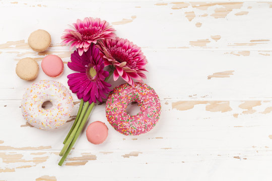 Donuts and gerbera flowers bouquet