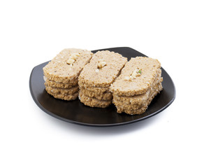 Indian Sweet Gud Kaju Gajak Isolated on White Background