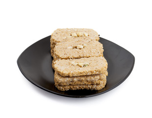 Indian Sweet Gud Kaju Gajak Isolated on White Background