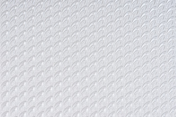 Fototapeta premium White self made paper pressed sheet texture background. Embossed lace pattern.