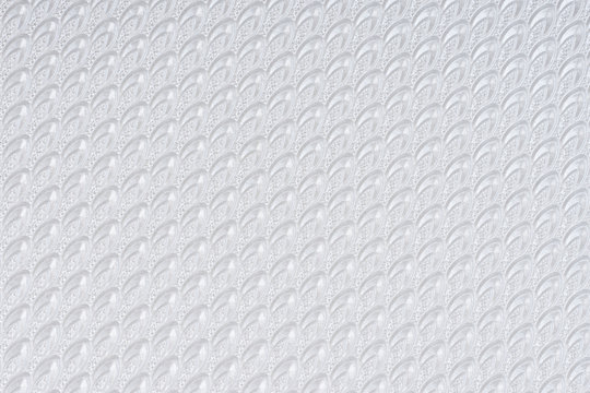 White self made paper pressed sheet texture background. Embossed lace pattern.