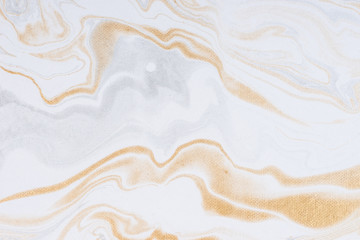 White paper sheet texture background. Flowing colors. Golden and silver fluid color pattern.