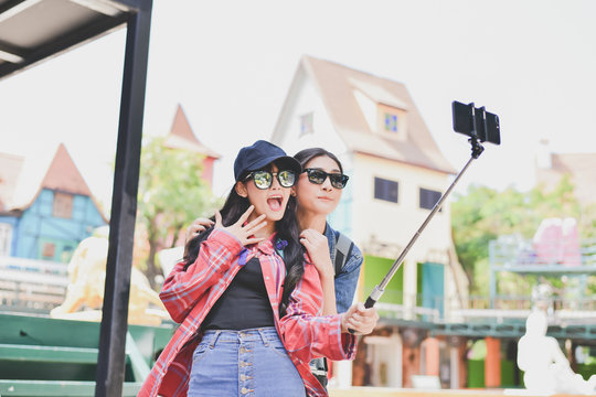 Tourists are taking photos in the city.