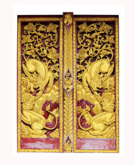 Traditional Thai pattern painting of base of windows of Buddhist church.