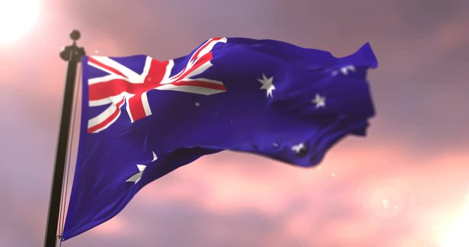 Flag of Australia waving at wind at sunset, loop