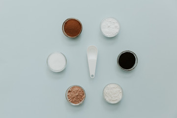 Flat lay ingredients for baking. Minimal baking over pastel background