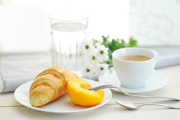 Sunny morning with Breakfast, coffee, croissant