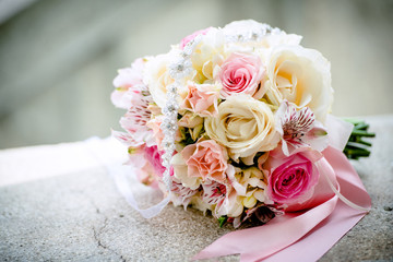 Bouquet of roses on table at wedding