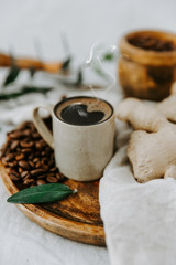 Fresh Turkish coffee in a cup with ginger