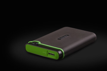 external hard drive on a black background