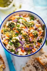 Crunchy cauli couscous. Diced cauliflower, carrot, red cabbage salad with pumpkin seeds & parsley, basil & thyme dressing