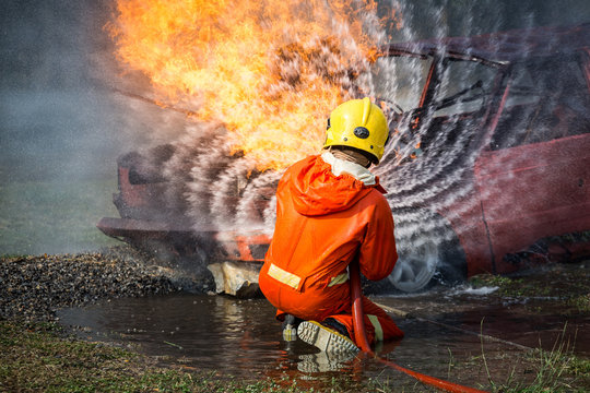 Firefighters training, Team practice to fighting with fire in emergency situation..Spray water to the flame