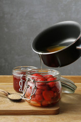 Making strawberry preserves.