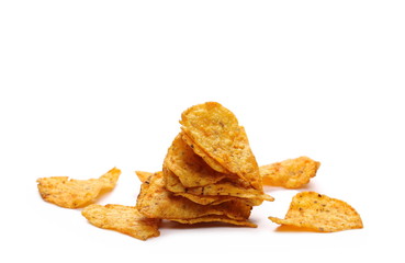 Chili flavored tortilla chips pile isolated on white background