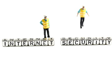 Internet security on beads with miniature scale model security guards isolated on a white background