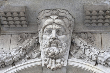Neoclassical building Somerset House in the district Covent Garden, relief on facade, London, United Kingdom.