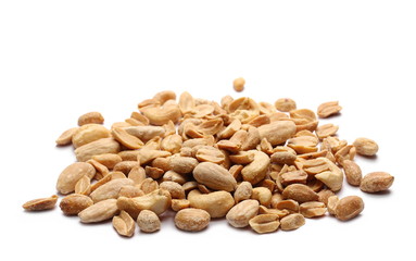 Salted and marinated peanuts with cashew nuts and almonds, pile isolated on white background