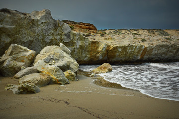 beautiful beach with rock formations in Milos