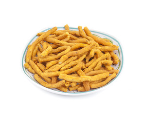Sev is a popular Indian snack food consisting of small pieces of crunchy noodles made from chickpea flour paste, which are seasoned with turmeric, cayenne, and ajwain before being deep-fried in oil.