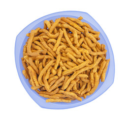 Sev is a popular Indian snack food consisting of small pieces of crunchy noodles made from chickpea flour paste, which are seasoned with turmeric, cayenne, and ajwain before being deep-fried in oil.