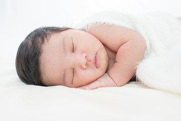 Fototapeta na wymiar Little newborn baby 7 days, sleeps