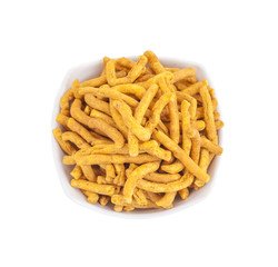 Sev is a popular Indian snack food consisting of small pieces of crunchy noodles made from chickpea flour paste, which are seasoned with turmeric, cayenne, and ajwain before being deep-fried in oil.