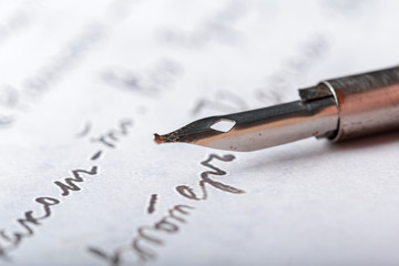 Fototapeta premium Fountain pen on an antique handwritten letter